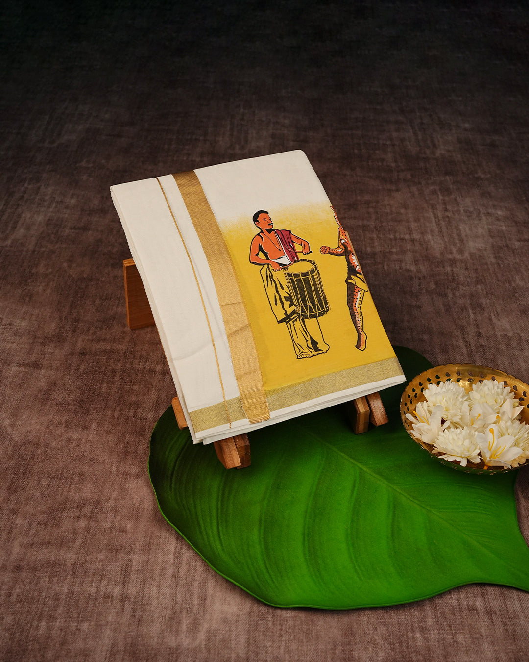 Cream Coloured Cotton Double Dhoti Finished with Onam Themed Prints & Gold Kara