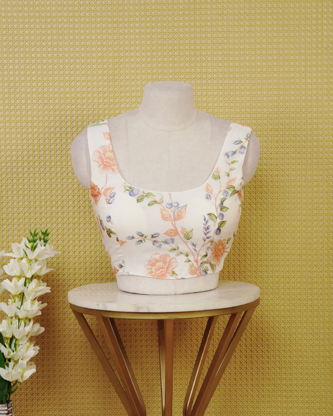 White Floral Print Sleeveless Blouse Featuring A Classic Scoop Neck, Delicate Peach Floral Print, And A Comfortable Tailored Fit.