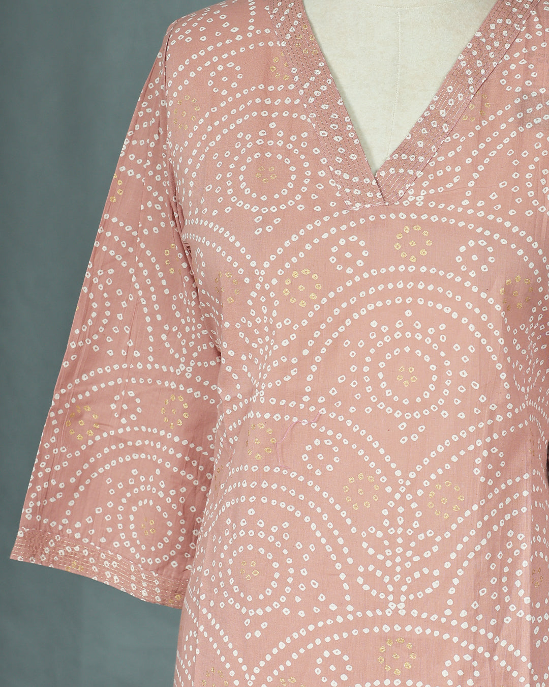 Peach Colour Kurti featuring print Work On body , a V neckline, With sleeve.