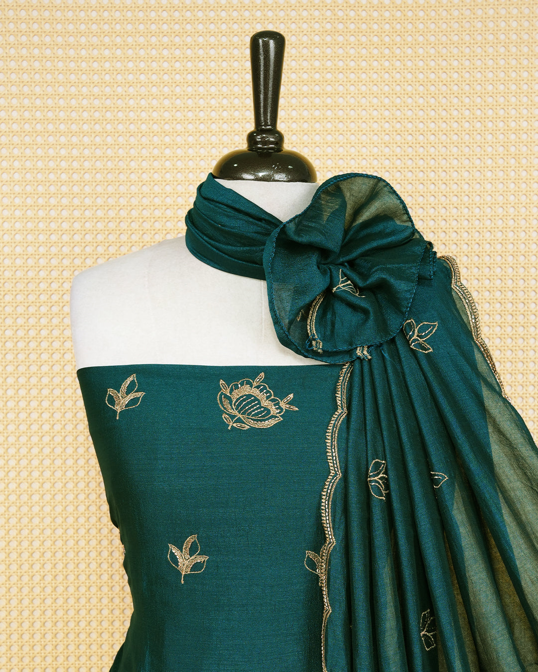 Dark Green Georgette Salwar Matirial Features an Elegant Floral Embroidary Pattern Adorned With Shimmering Metalic Gold Thread and Bead Work, paired with matching bottom & elegant Duptta