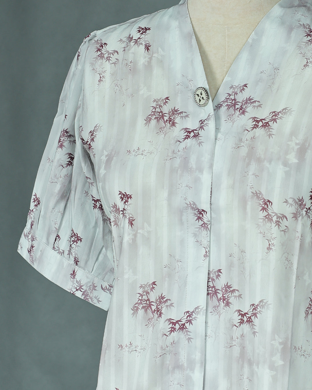 Light Red colour Top with Leaf Print work on body, collar design, With sleeve.
