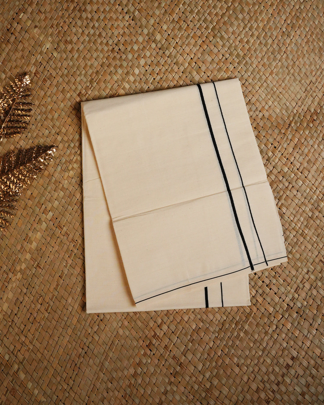 Cream colour cotton single dhoti featuring Black colour simple border.