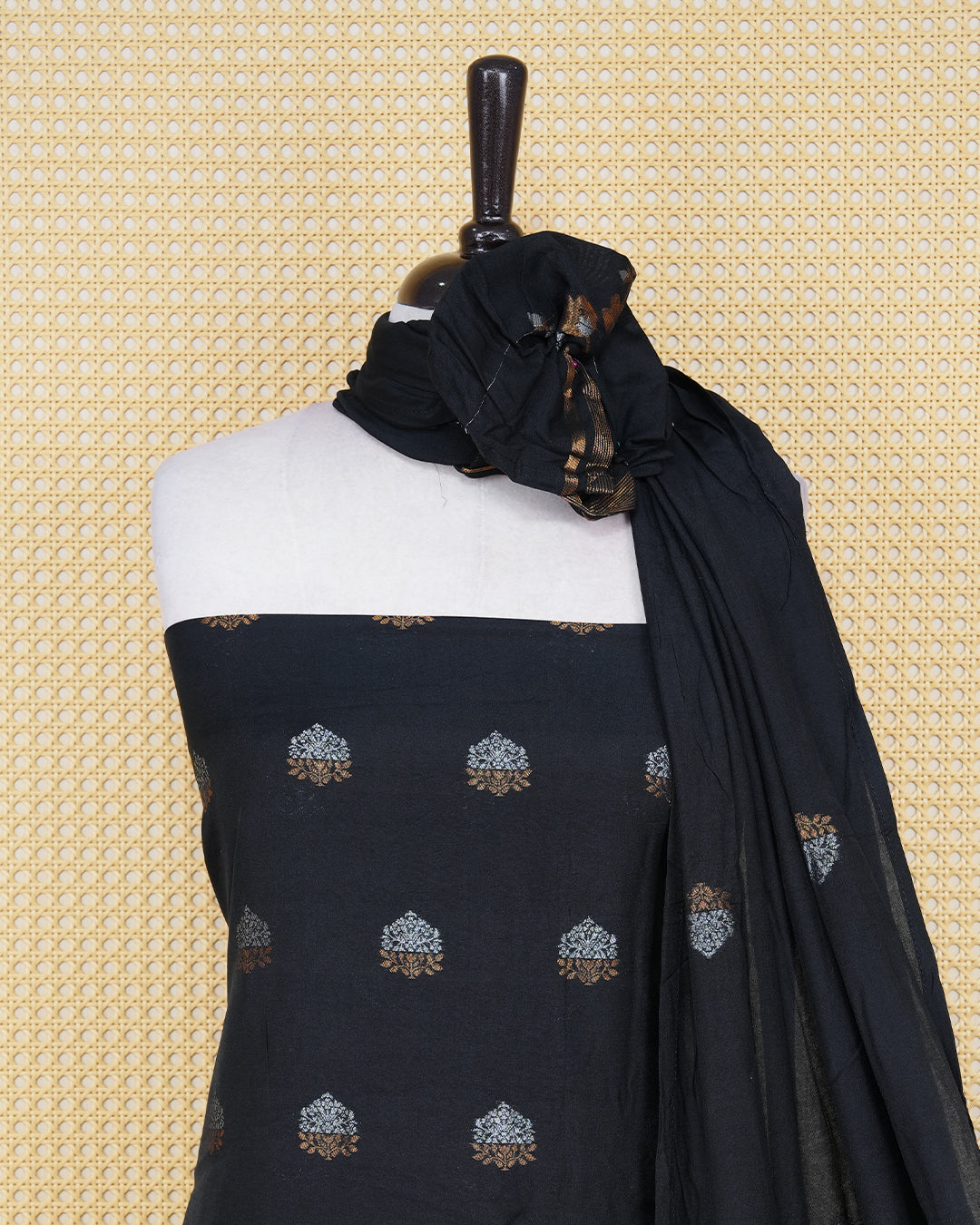 Black colour Georgette Salwar material Featuring Gold & silvar zari floral motifs on body, paired with matching bottom & Elegant Dupatta