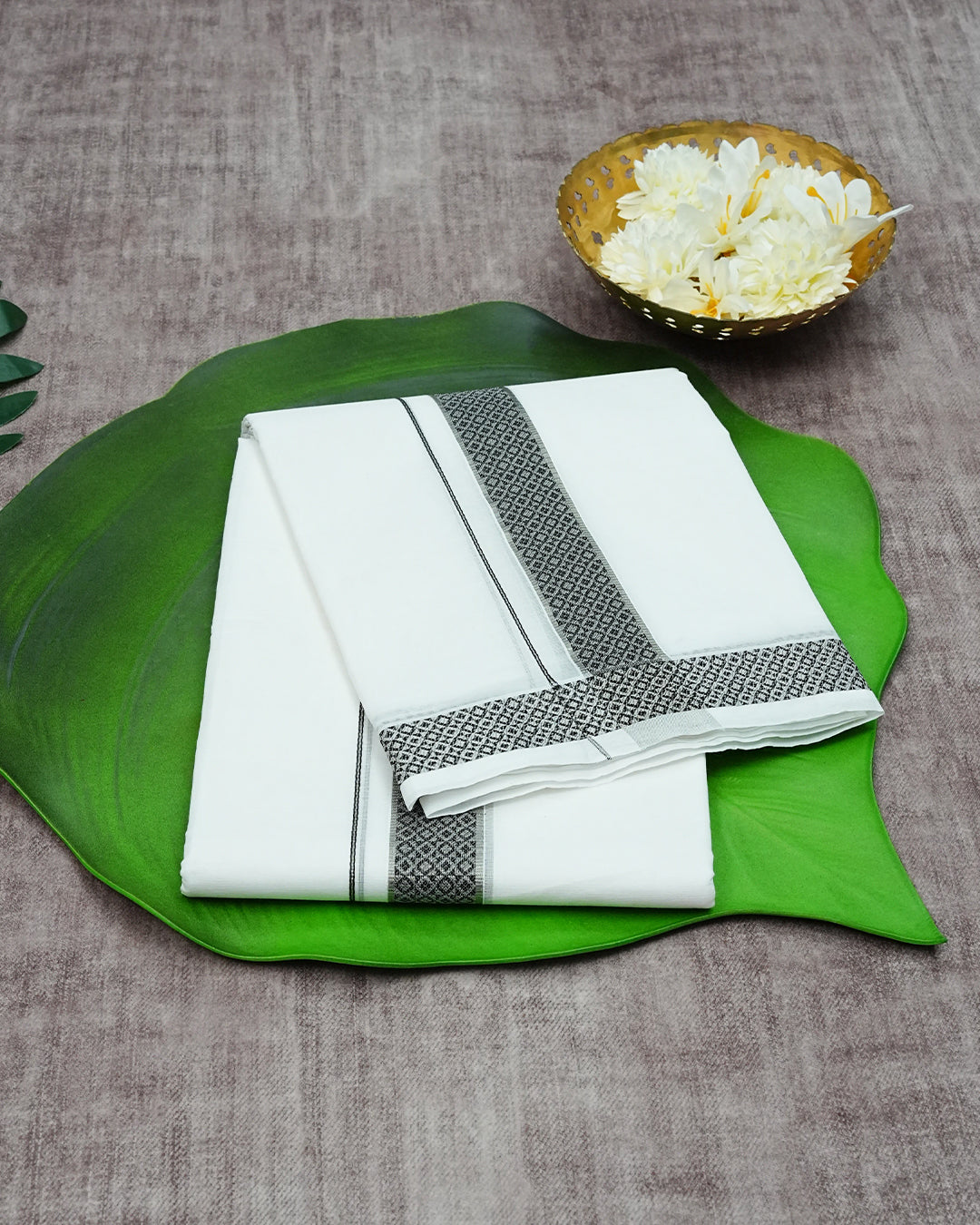 Off White Colour Cotton Double Dhoti Finished With A Black Designed Pattern On Silver kara.