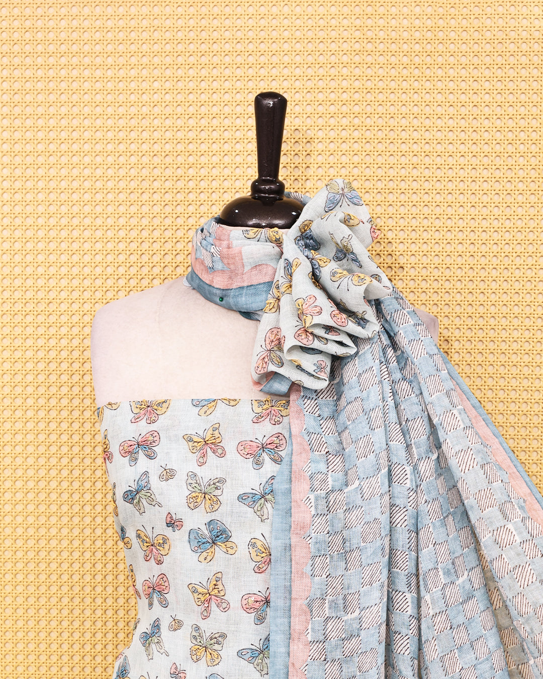 Pastel blue colour linen Salwar Material featuring delightful multicolor butterfly motifs, paired with a classic white bottom and a beautifull dupatta