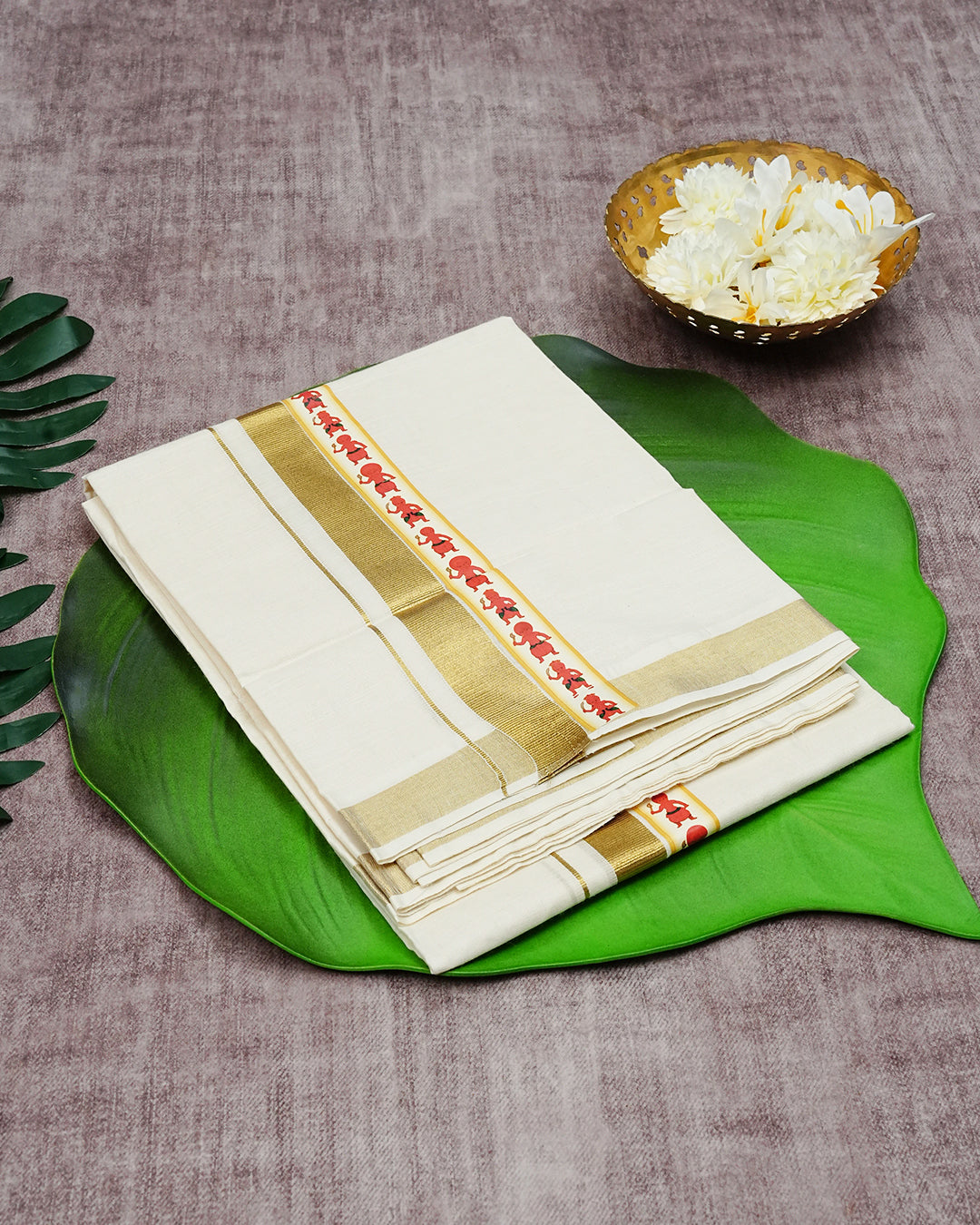 Cream Coloured Cotton Double Dhoti Finished with Indian Arts Form Prints & Gold Kara