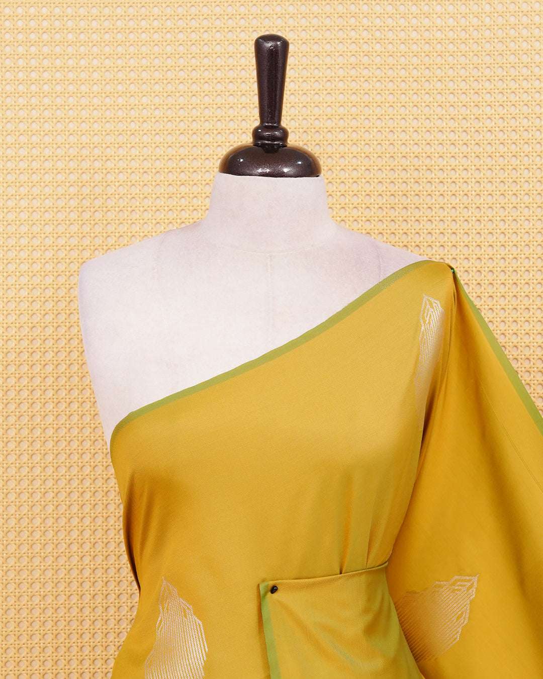Mehandi colour semi silk saree.