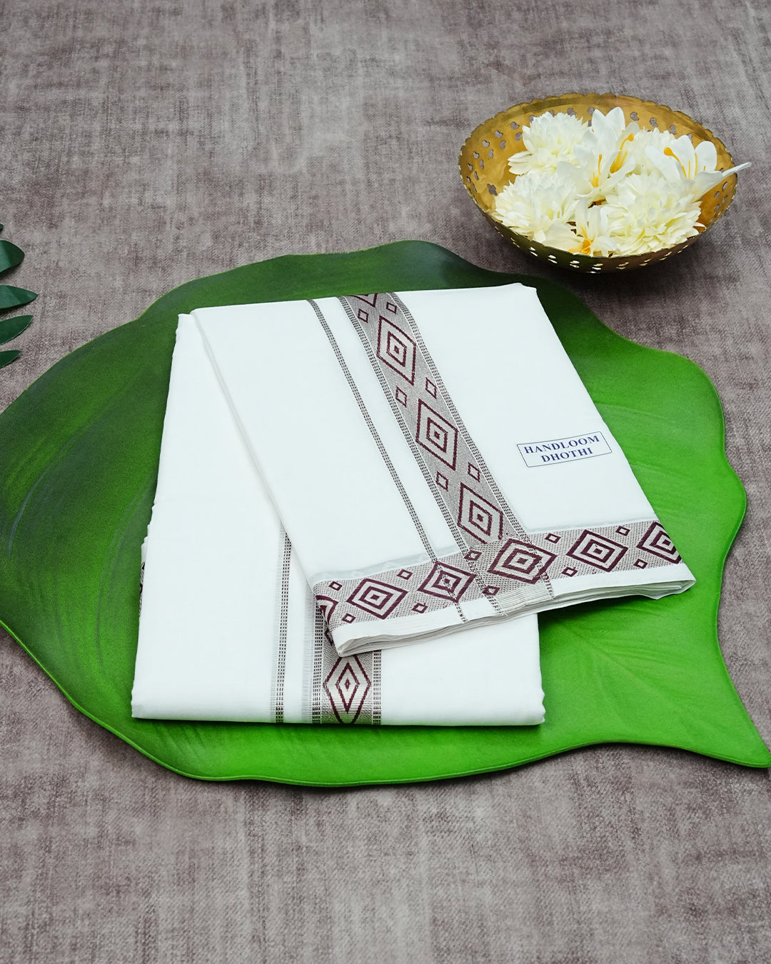 Off White Colour Handloom Cotton Double Dhoti Finished With A Maroon Designed Pattern On Rose Gold kara.