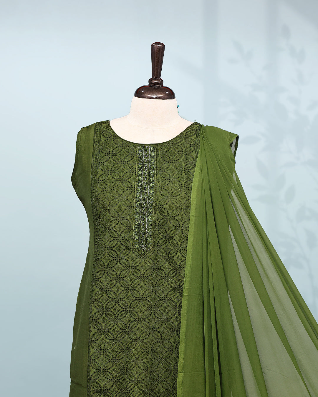 Olive Green colour Salwar set comes top with Self colour thread worked body, paired with matching bottom and dupatta.