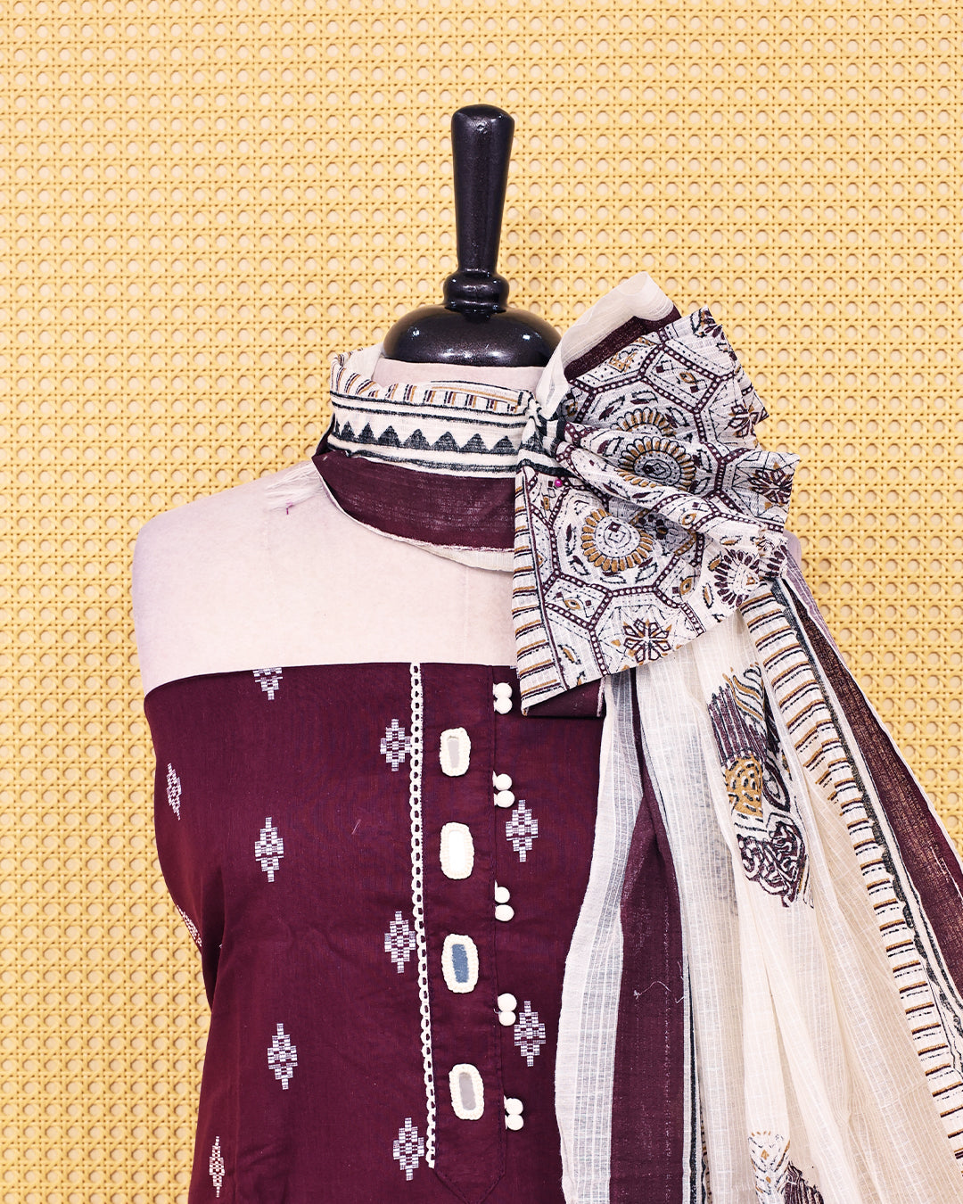 Wine colour Cotton salwar material featuring Thread with mirror work on body, paired with matching bottom & dupatta.
