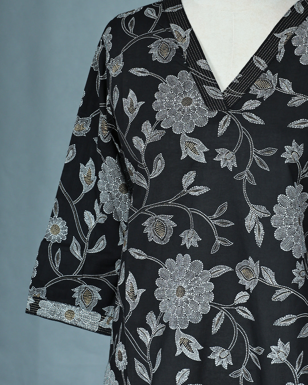 Black Colour Kurti featuring print Work On body , a V neckline, With sleeve.