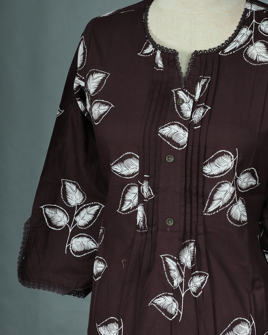 Dark Chocolate Colour Kurti featuring print Work On body , a Round with V neckline, With sleeve.