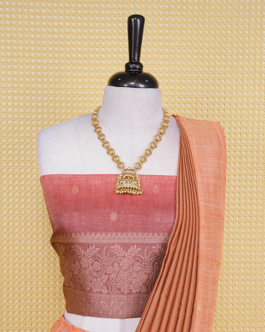 Burnt orange & maroon colour Linen Silk Semi stitched dhavani set featuring buttas, zari bordered skirt & blouse piece and dupatta.