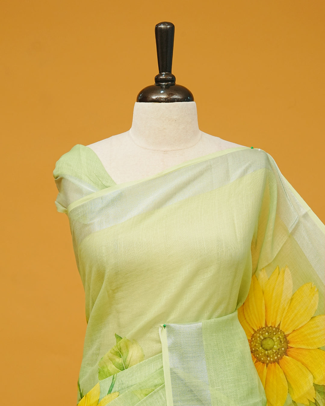 Piata Green Colour Semi Linen Saree featuring Sunflower prints, paired with matching blouse piece.