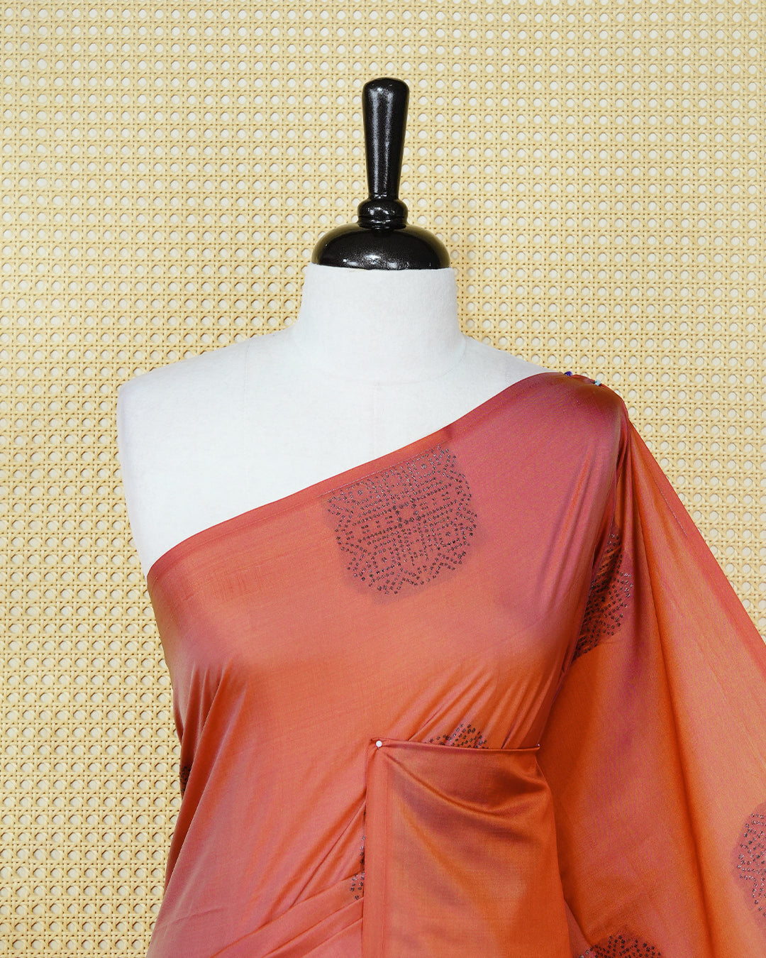 Brick orange colour soft silk saree featuring antique zari motifs on body with contrast self colour pallu & paired with matching blouse piece.