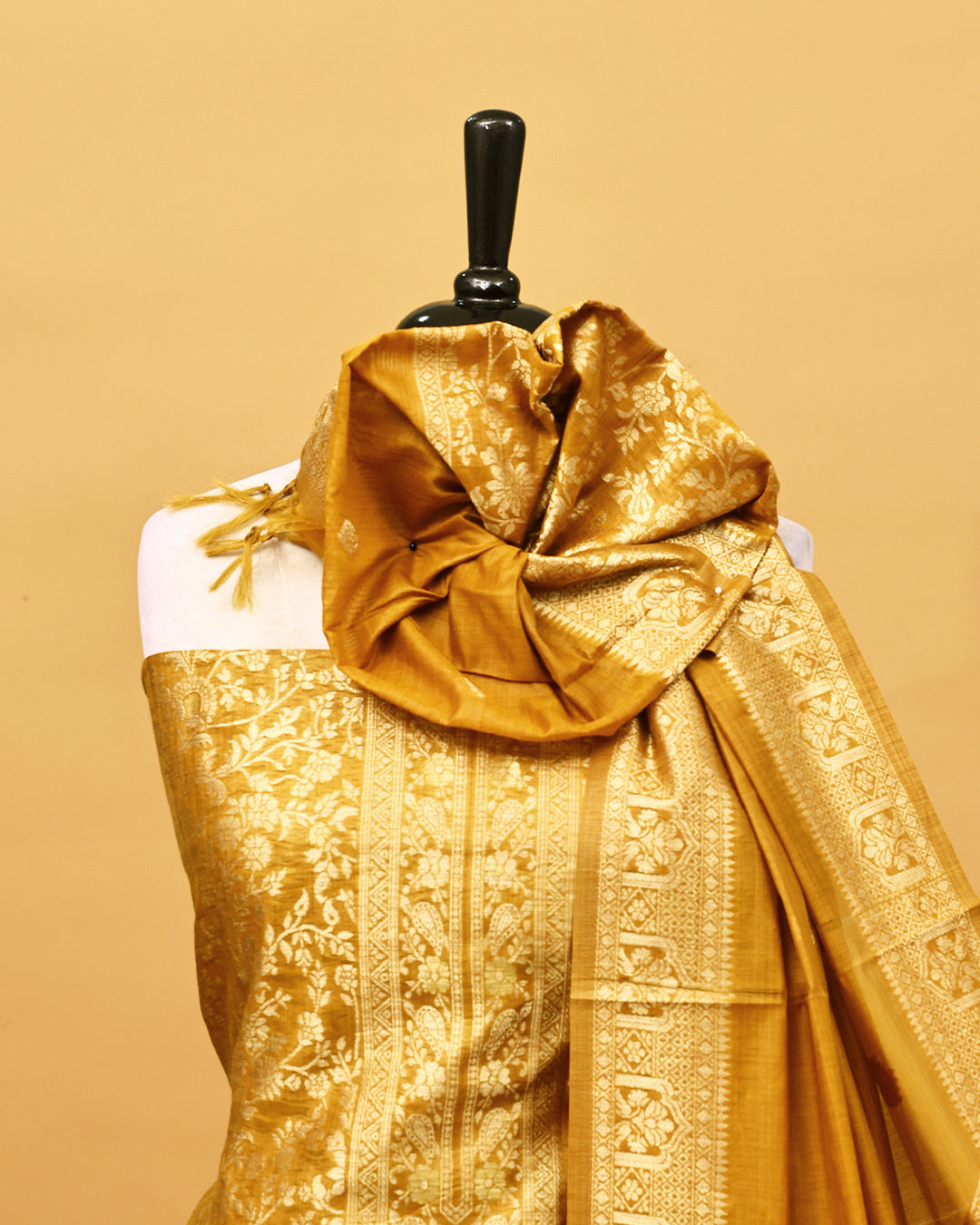 Golden colour Banaras Salwar material with gold zari floral kodi pattern work on body, matching bottom & Dupatta.