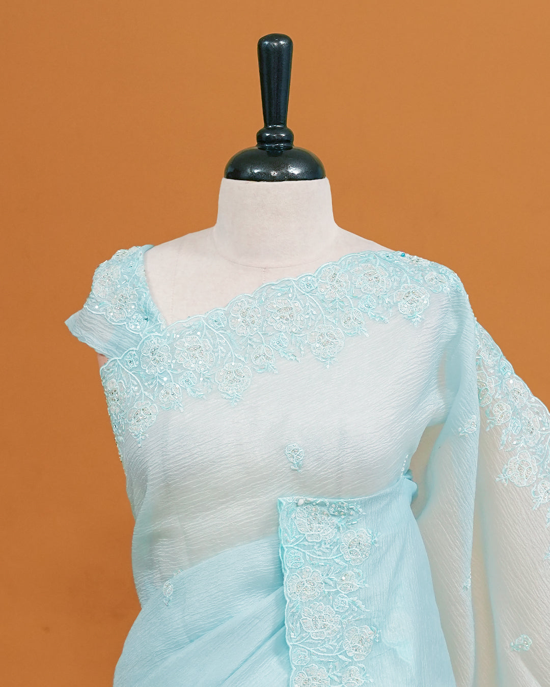 Sky Blue colour Crush organza saree with Cut Beats & Sequins.