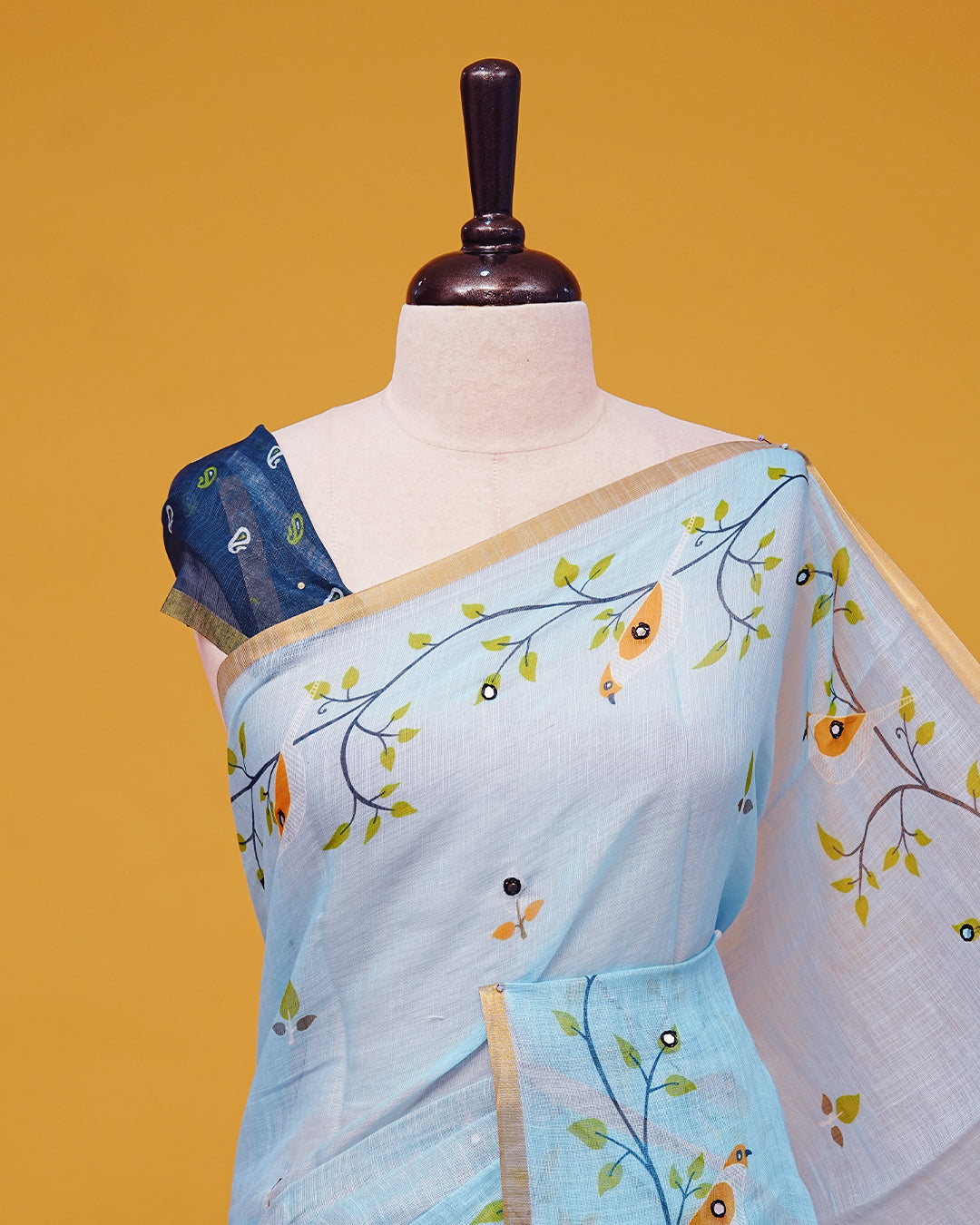 Light Blue Colour Semi Linen Saree featuring birds print with mirror work, paired with matching printed blouse piece.