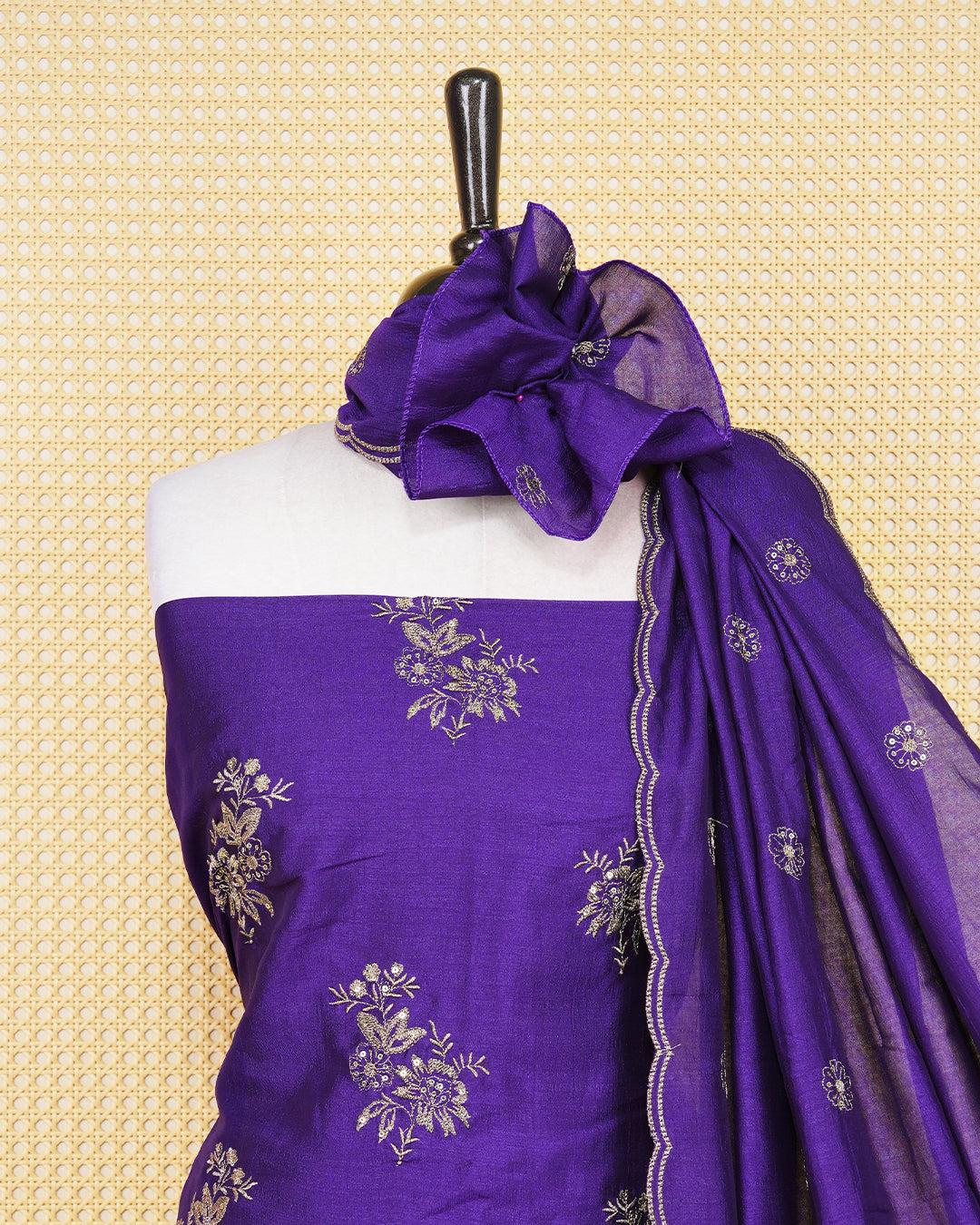 Royal Violet Georgette Salwar Matierial Features an Elegant Floral Embroidery Pattern Aborned With Shimmering Metalic Gold Thread and Sequin Accents, pired with matching bottom & elegant Duptta