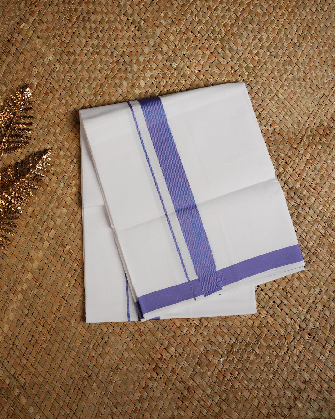 White colour cotton single dhoti featuring pink & Blue border.