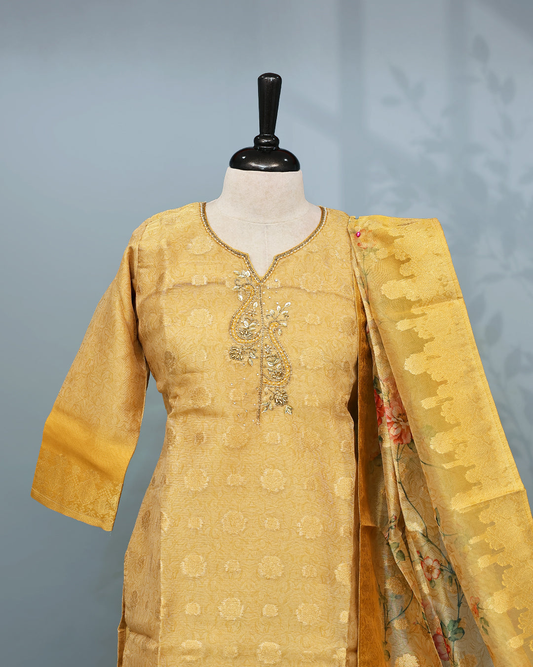 Gold colour Salwar set comes top with Gold zari work with Beats & cutbeats on body, paired with matching bottom and dupatta.
