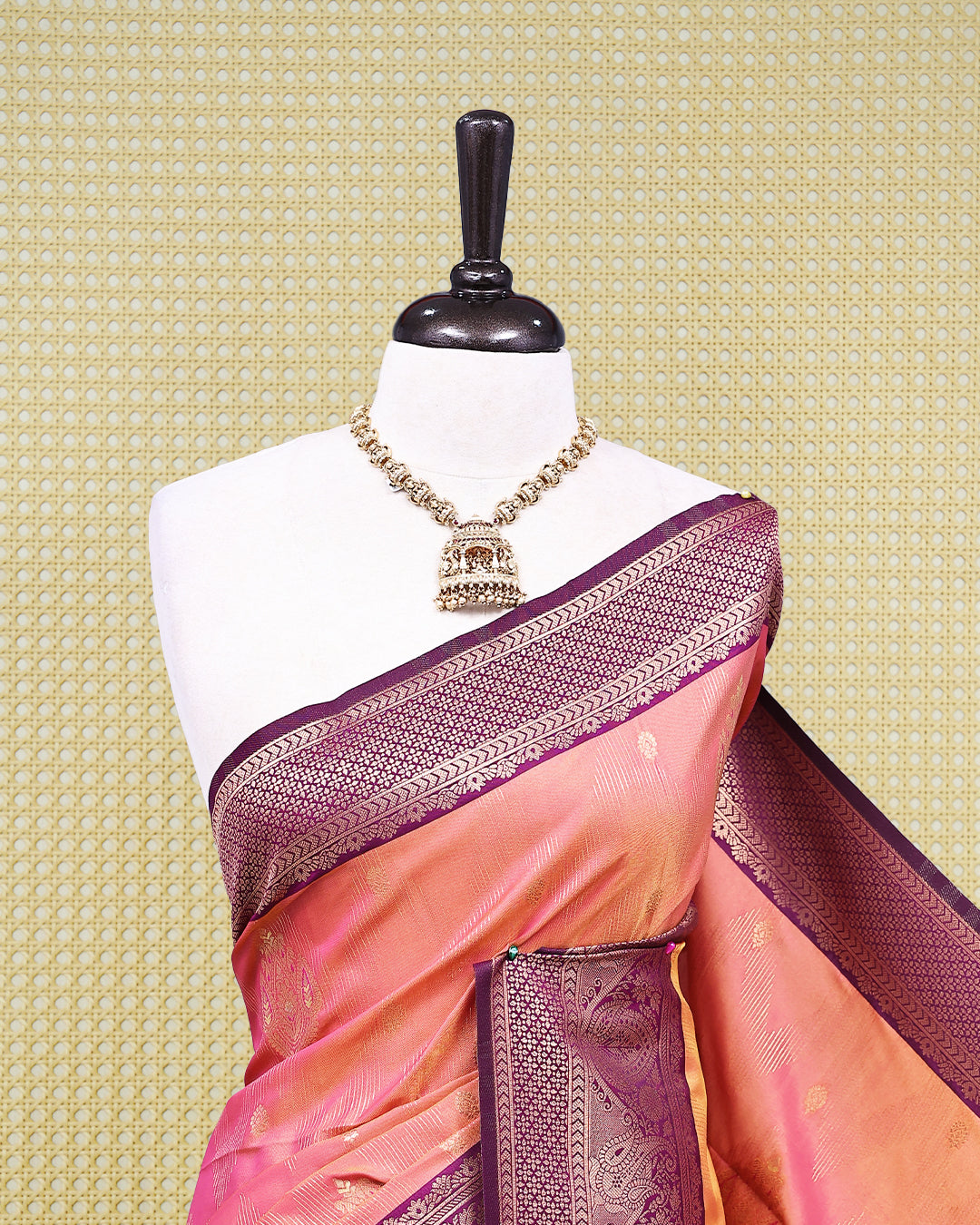 Peach & gold double shade Mulberry silk saree featuring floral gold zari patterns on body, paired with contrast purple colour with traditional border, comes with matching blouse piece.