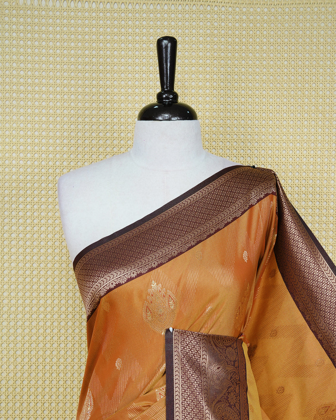Copper & gold double shade Mulberry silk saree featuring floral gold zari patterns on body, paired with contrast teal colour with traditional border, comes with matching blouse piece.