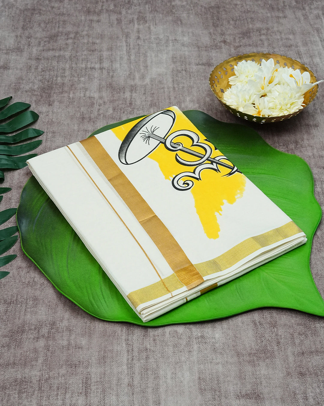 Cream Coloured Cotton Double Dhoti Finished with Onam Themed Prints & Gold Kara