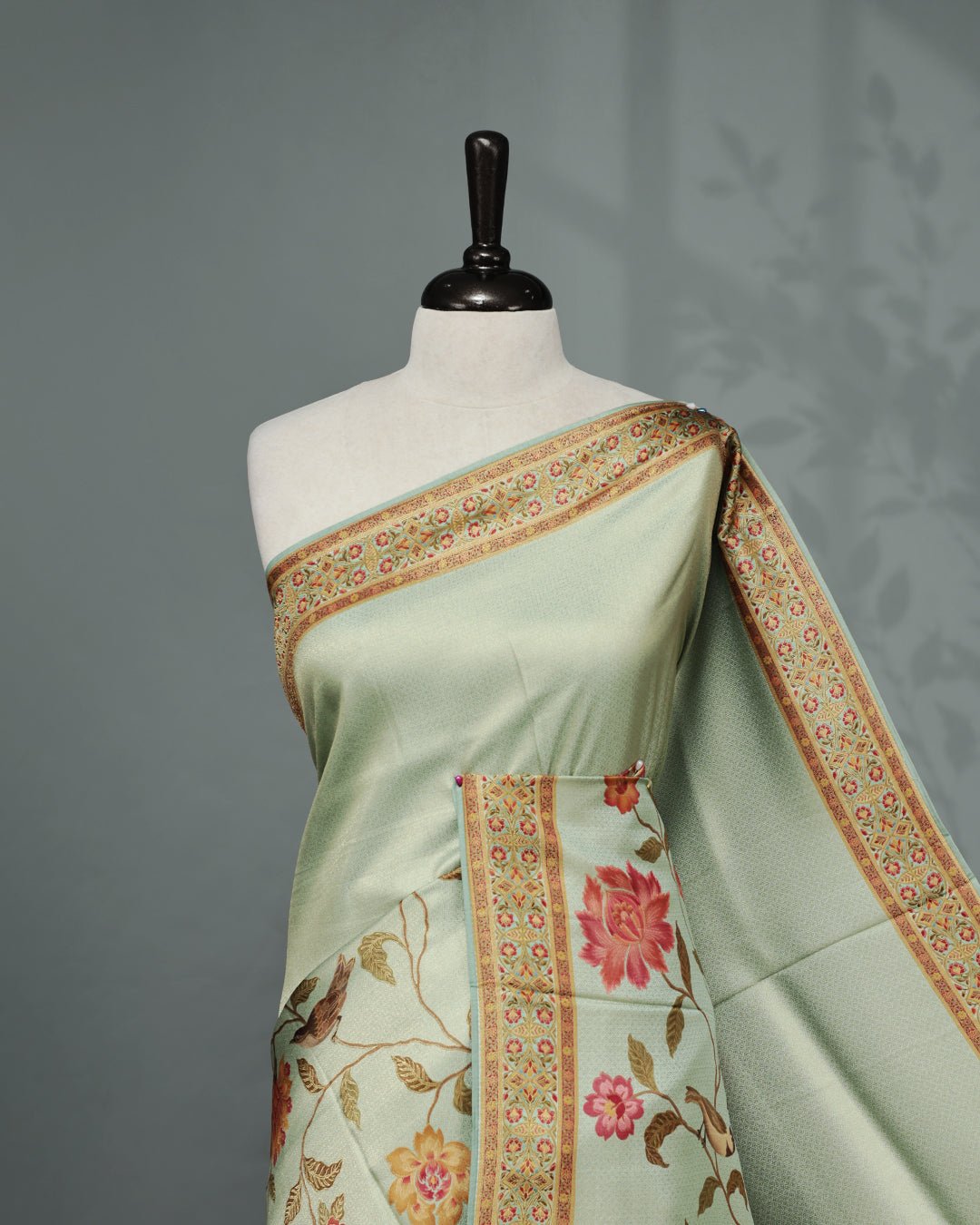 Mint Colour Pashmina Saree featuring a Patterned body, complemented by Self colour with Floral pattern & gold zari on border and Pallu, comes with matching blouse piece.