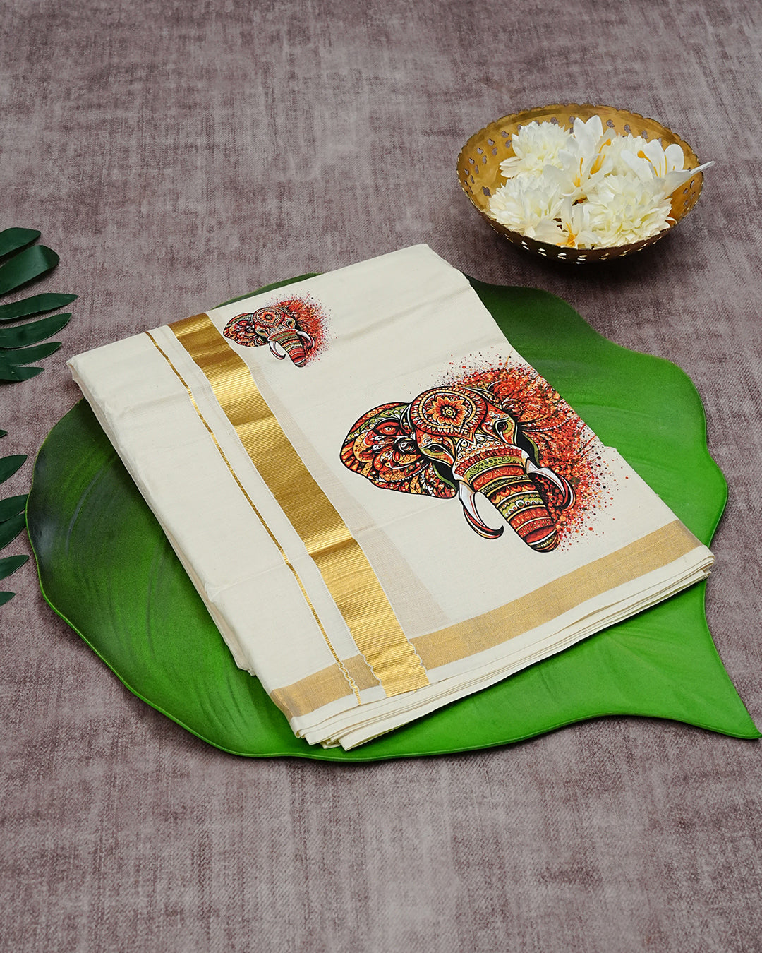Cream Coloured Cotton Double Dhoti Finished with Elephant Prints & Gold Kara