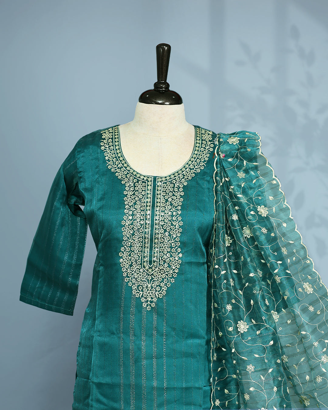 Peacock Green colour salwar set with Sequins & thread work on top, paired with matching bottom & Dupatta.