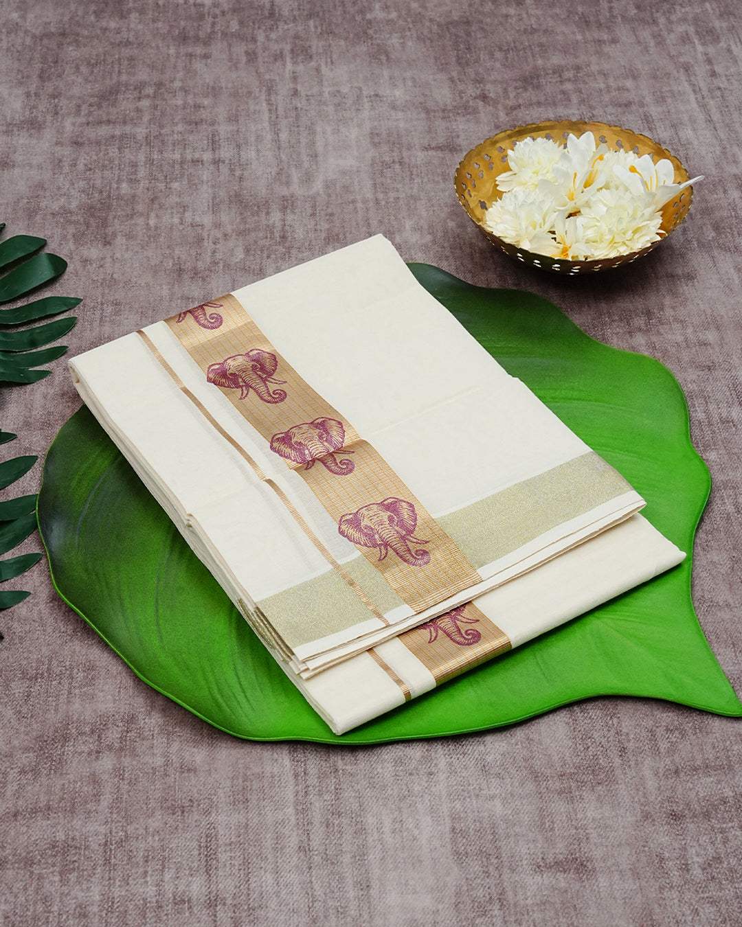 Cream Coloured Cotton Double Dhoti Finished with Magenta Elephant Prints On Gold Kara