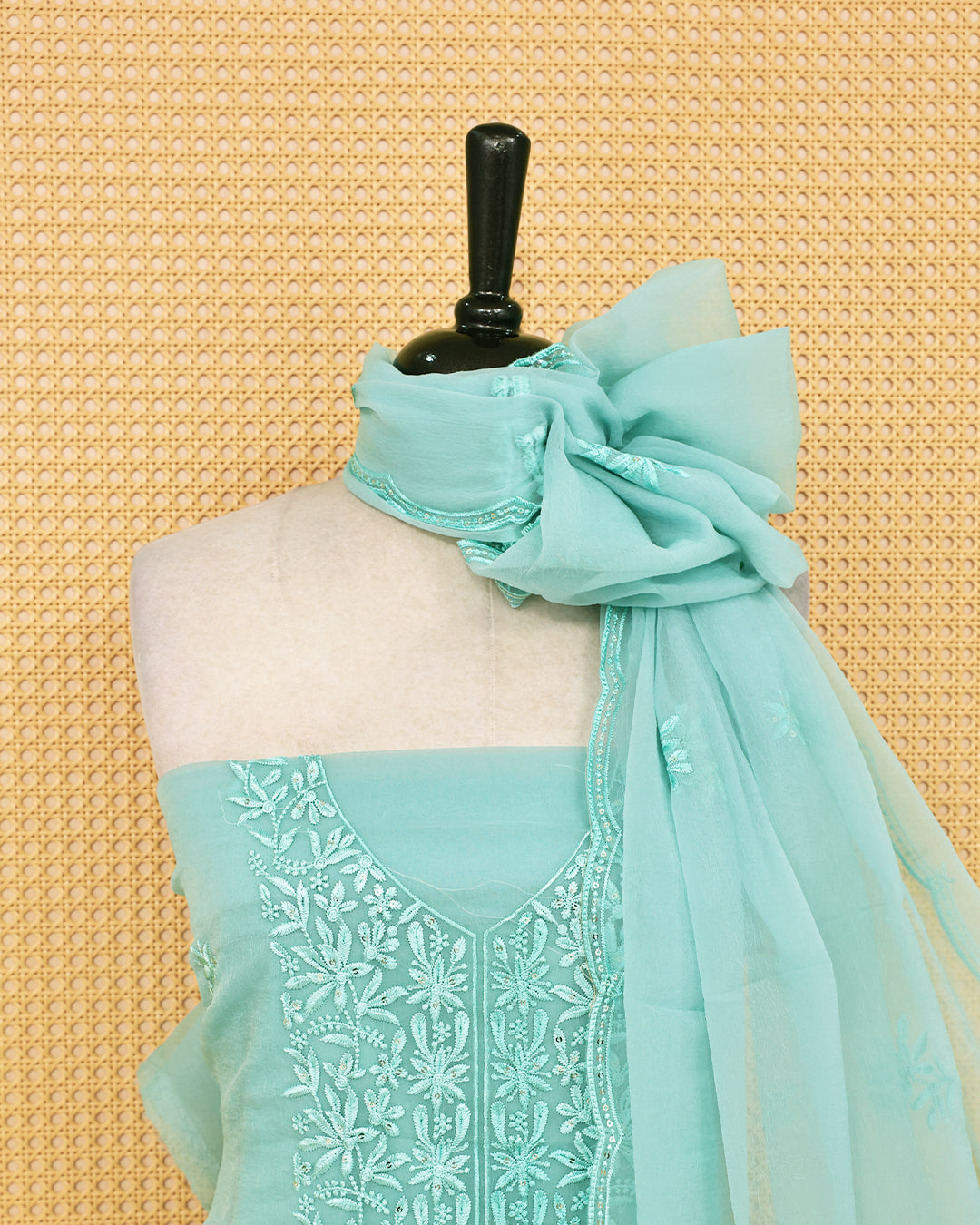 Pastel green colour Crush organza salwar material featuring thread work on body, paired with Matching bottom & dupatta.