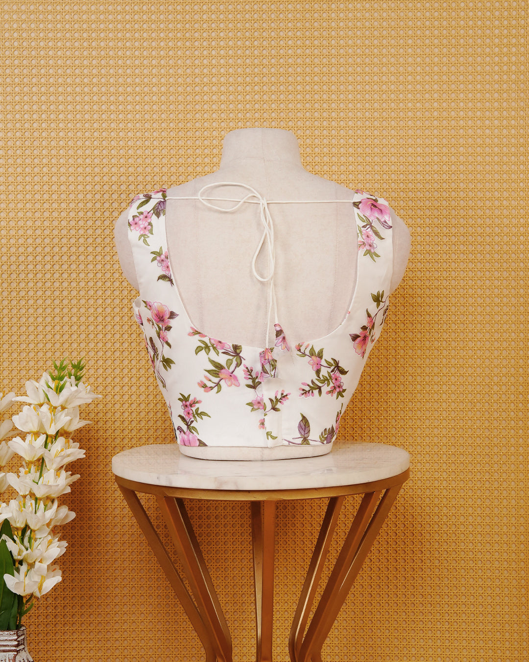 White Floral Print Sleeveless Blouse Featuring A Classic Scoop Neck, Delicate Pink Floral Print, And A Comfortable Tailored Fit.