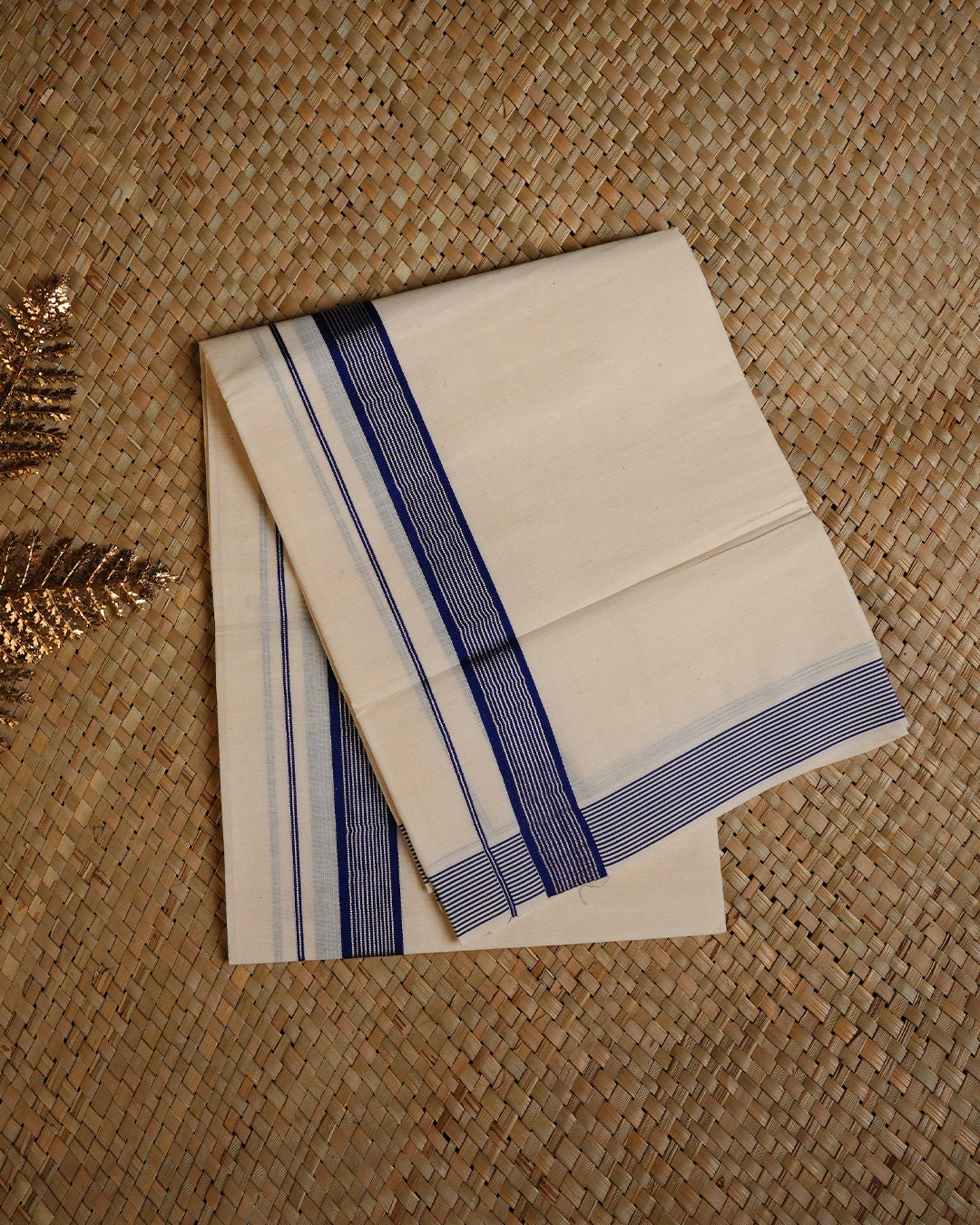 Cream colour cotton Single dhoti featuring Blue & silver border.