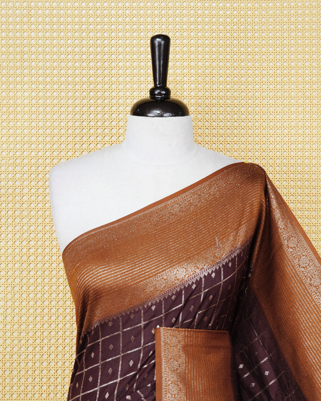 Dark brown Colour Semi georgette Saree having zari check with buttas pattern on body, contrast dark mustard colour floral designed border, Rich Pallu comes with Matching Blouse piece.
