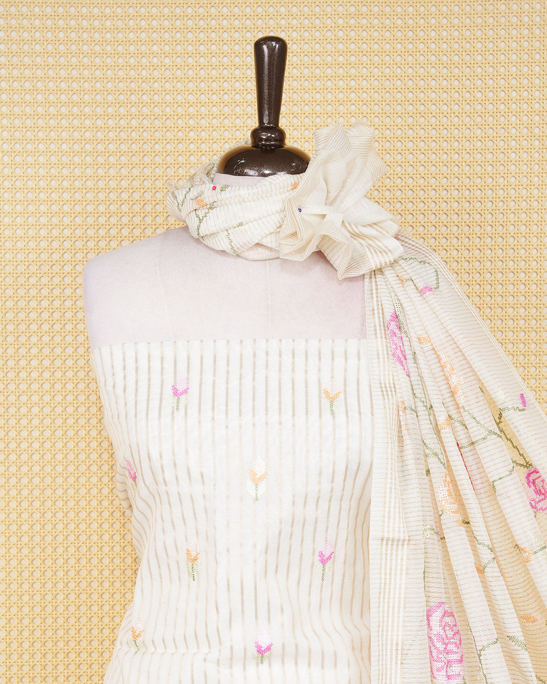 Cream colour tissue salwar material featuring beautiful floral embroidery design with elegant border, paired with matching bottom and beautiful dupatta.