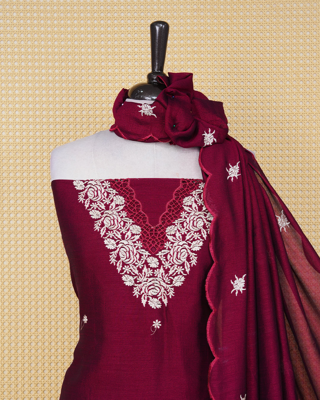 Maroon colour Georgette Salwar material featuring an Floral Threadwork on Body, paired with a matching bottom and an elegant dupatta.