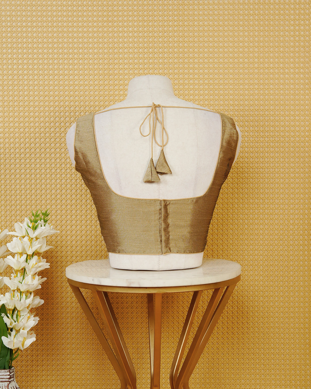 Light Gold colour Sleeveless Blouse Featuring A Classic Scoop Neck, Smooth Finish, And A Comfortable Tailored Fit.