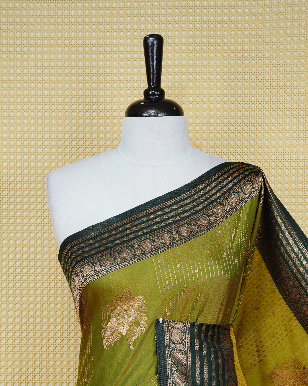 Olive & gold double shade Mulberry silk saree featuring gold floral zari patterns on body , paired with contrast forest green colour with traditional border, comes with matching blouse piece.