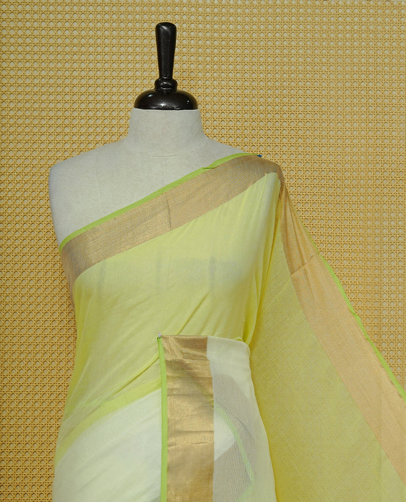 Light green & White Colour Half & Half Mul cotton saree Complemented by contrast Green colour Border & tassels.