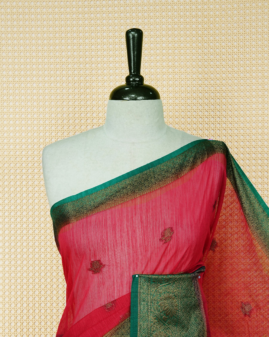 Magenta colour semi linen saree thread motifs on body, contrast teal green colour gold zari border, rich pallu comes with matching blouse piece