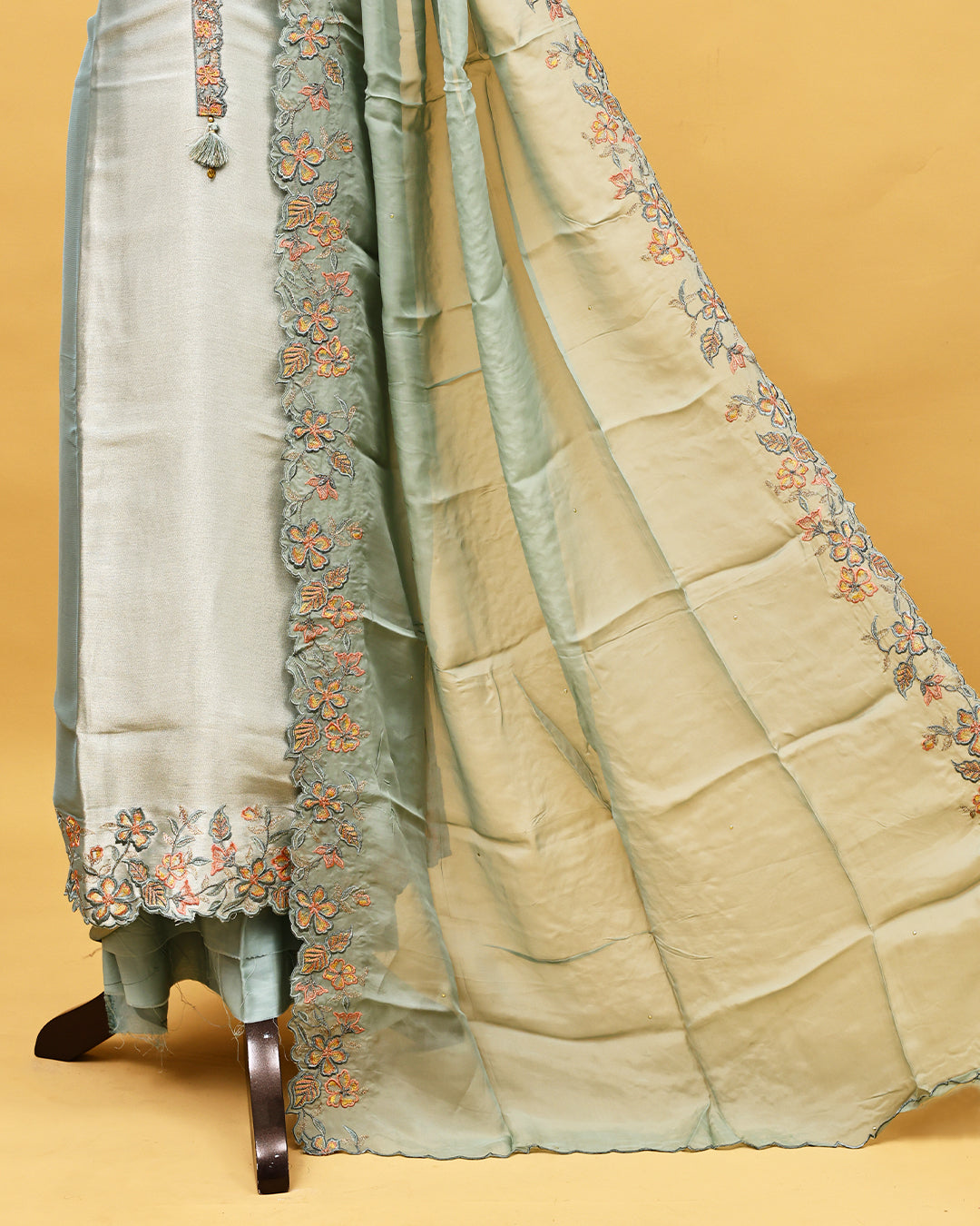 Pastel Aqua colour Organza Salwar material with Thread work on body, matching bottom & Dupatta.