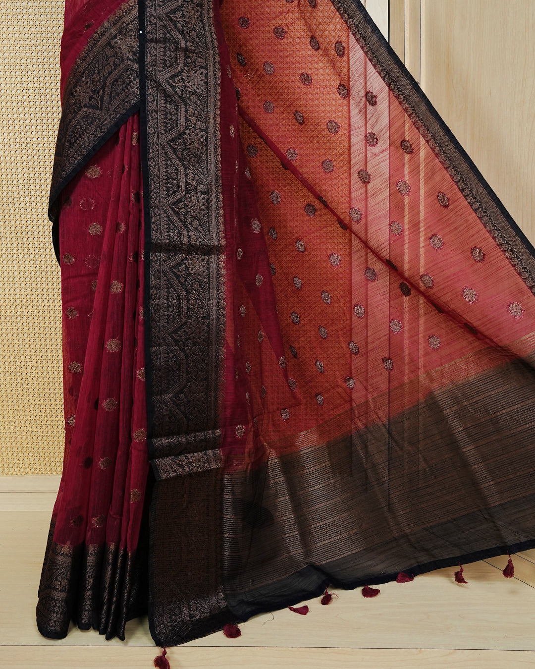 Maroon colour semi linen saree thread motifs on body, contrast dark colour gold zari border, rich pallu comes with matching blouse piece