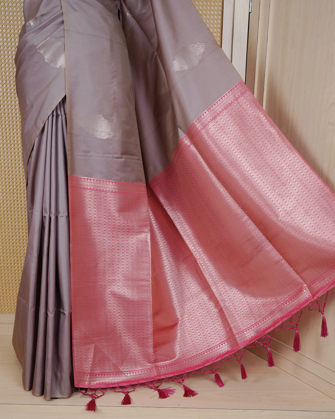 Greyish Cream colour semi silk saree.