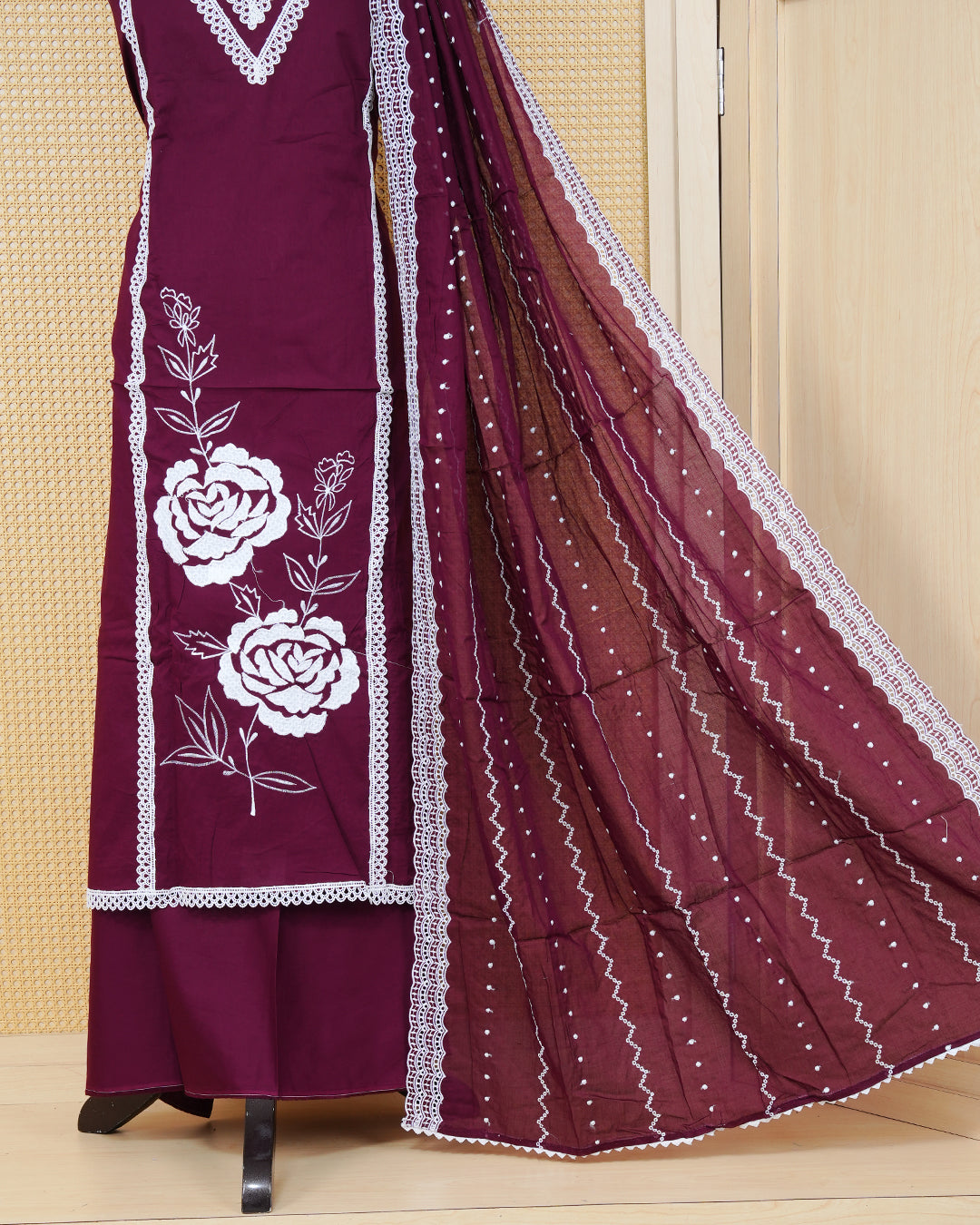 Deep Wine colour Cotton Salwar Material Featuring an Threadwork on Body, lace work on neck portion, Paired With a Matching Bottom and an Elegant Dupatta.