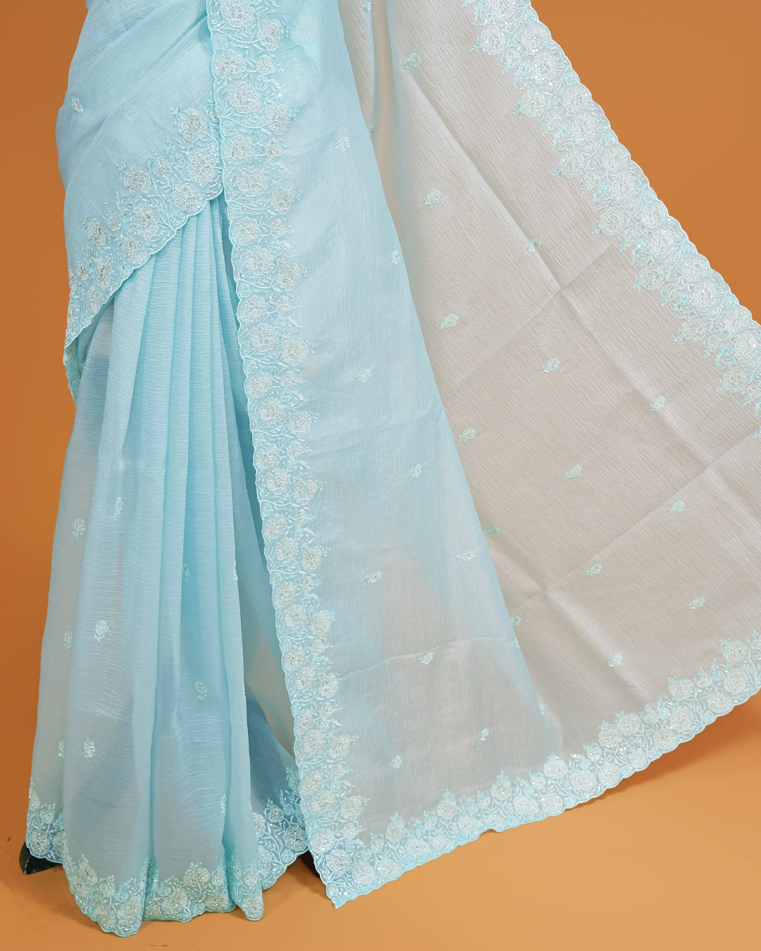 Sky Blue colour Crush organza saree with Cut Beats & Sequins.