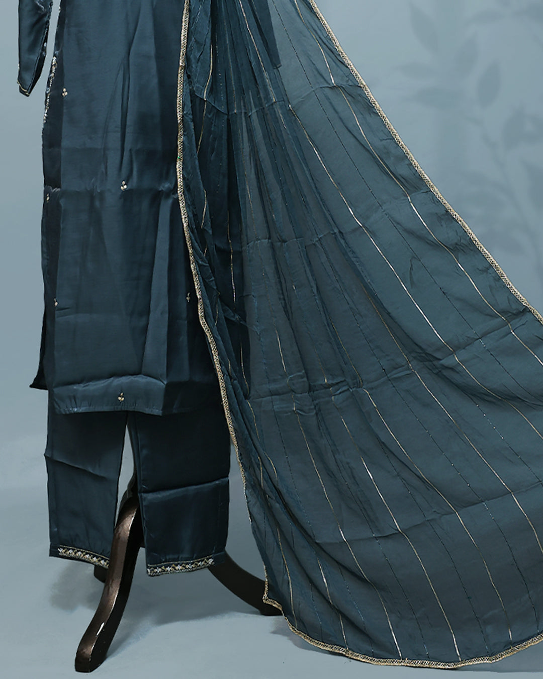Teal colour salwar set with Stone work on top, paired with matching bottom & Dupatta.