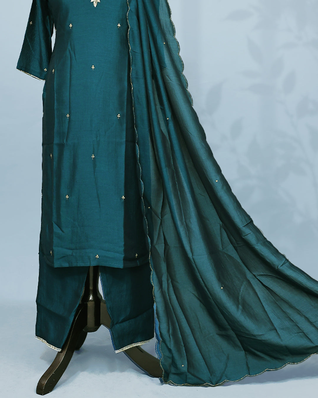 Green colour Salwar set comes top with Stone & beats on neck line and buttas in body, paired with matching bottom and dupatta.