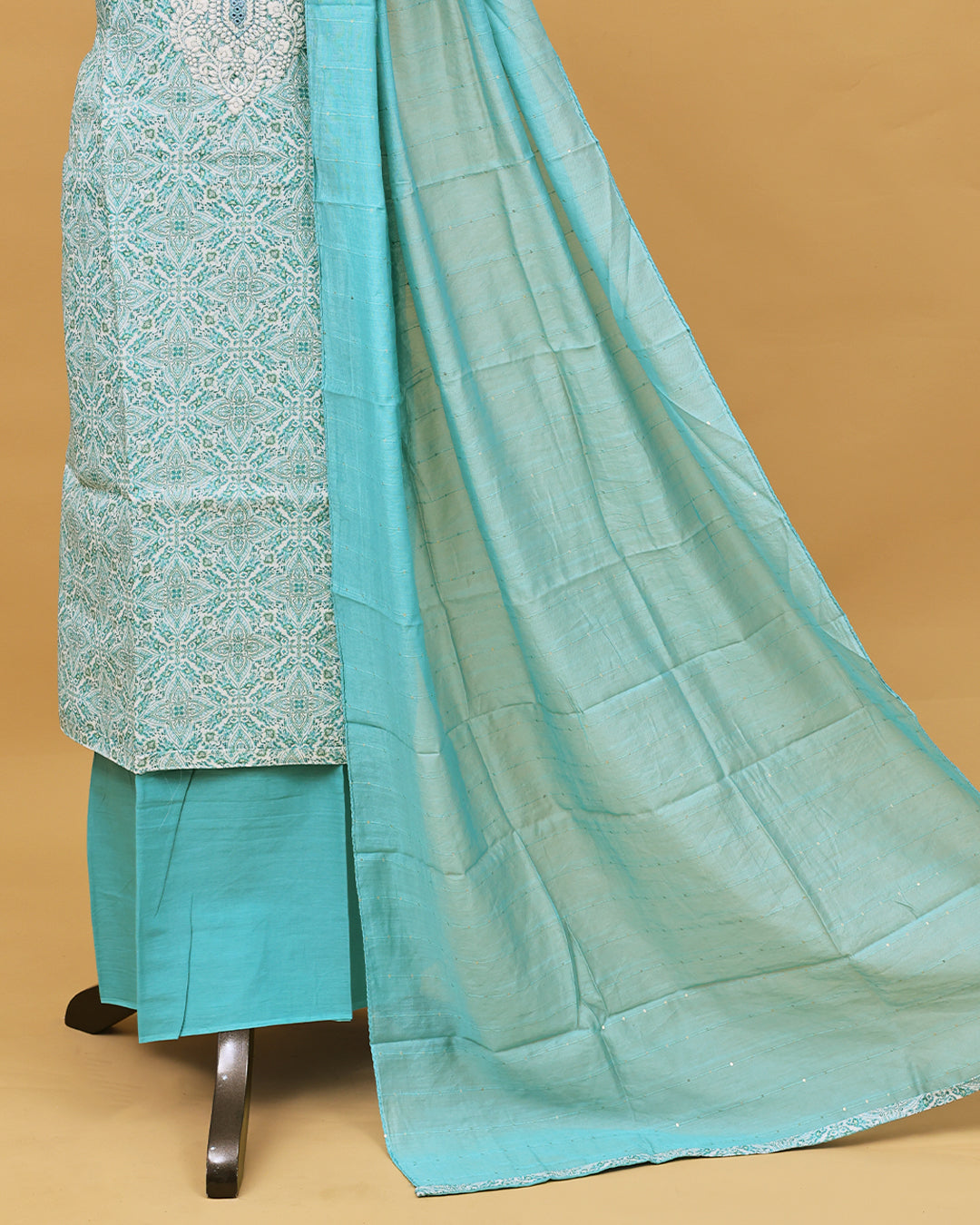 Cream colour Net cotton Salwar material with Green colour floral kodi pattern work on body, matching bottom & Dupatta.